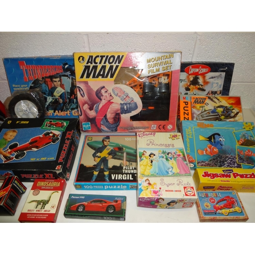 686 - A Box of Games and Jigsaws including Thunderbirds, Captain Scarlett and Action Man