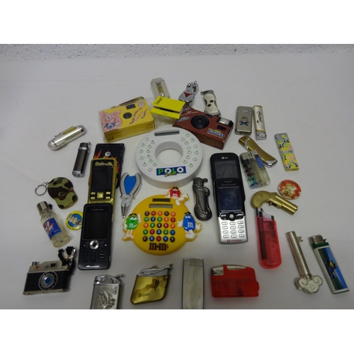 694 - A Quantity of Cigarette Lighters, Mobile Phones etc