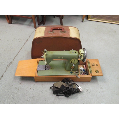 812 - A Vintage Electric Sewing Machine in Case