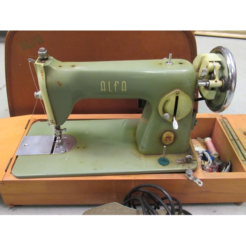 812 - A Vintage Electric Sewing Machine in Case