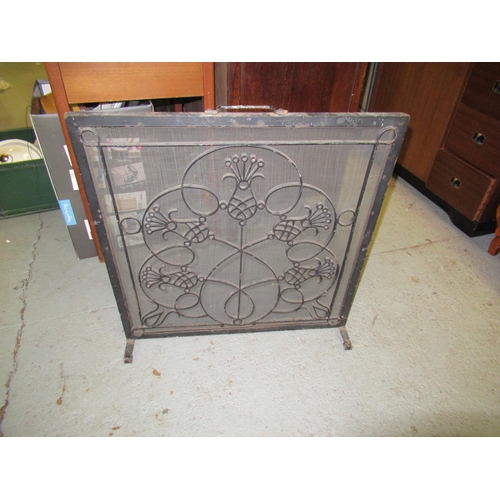 824 - An Ornate Metal Fire Screen 63cm Wide and 66cm High