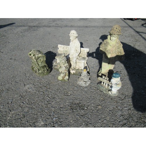 696T - A Quantity of Stone Garden Ornaments inc. Man on Bench, House etc.