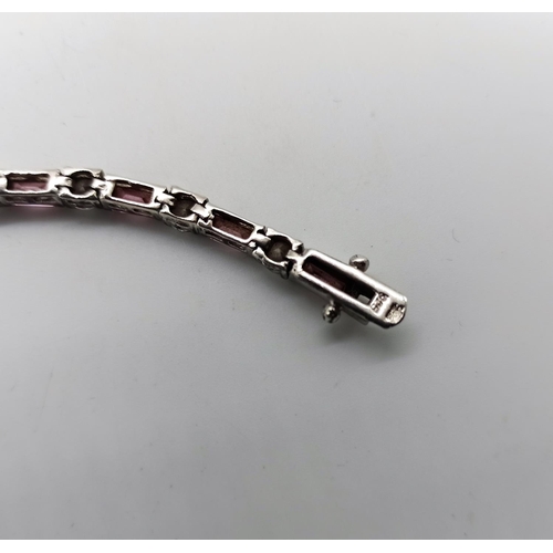 35a - A Silver Bracelet with Pink and White Quartz Stones