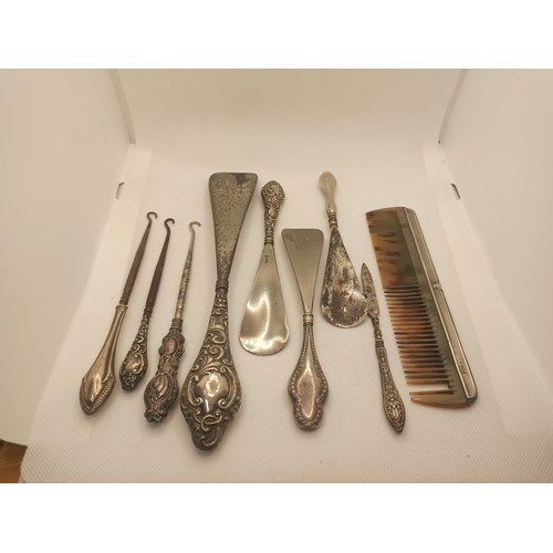 7E - 3 Victorian Hallmarked Silver Button Hooks, 4 Shoe Horns, a Nail file and a Comb (losses to comb tin... 
