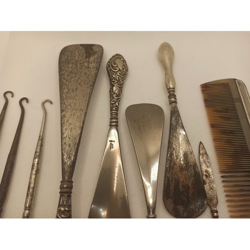 7E - 3 Victorian Hallmarked Silver Button Hooks, 4 Shoe Horns, a Nail file and a Comb (losses to comb tin... 