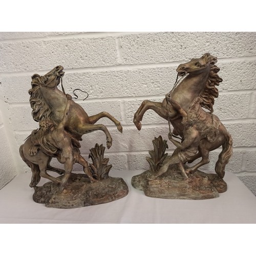 43g - A Large Pair of opposing gilded Spelter Marley Horses approx 42 x 32cm