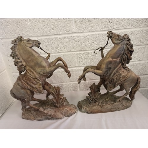 43g - A Large Pair of opposing gilded Spelter Marley Horses approx 42 x 32cm