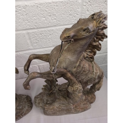 43g - A Large Pair of opposing gilded Spelter Marley Horses approx 42 x 32cm