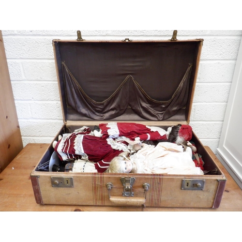 195 - 7 x Porcelain Collectable Dolls in Suitcase