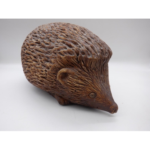 254a - A Large Heavy Pottery Hedgehog Ornament/ Doorstop 26cm Long