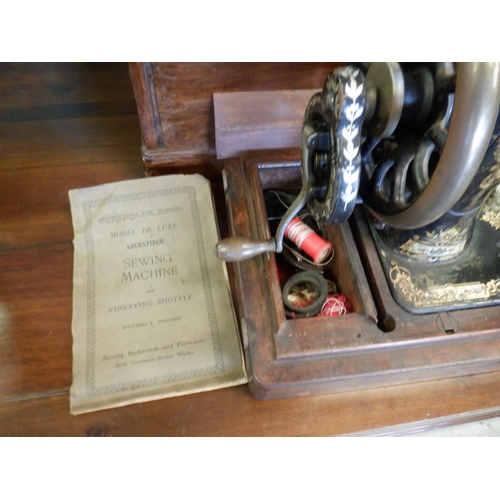 66 - A Hand Crank Antique Sewing Machine