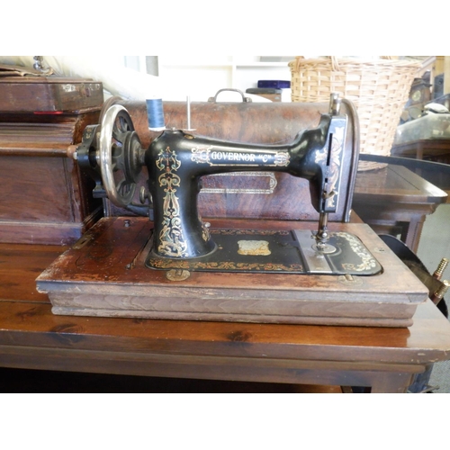 67 - A Hand Crank Governor Sewing Machine