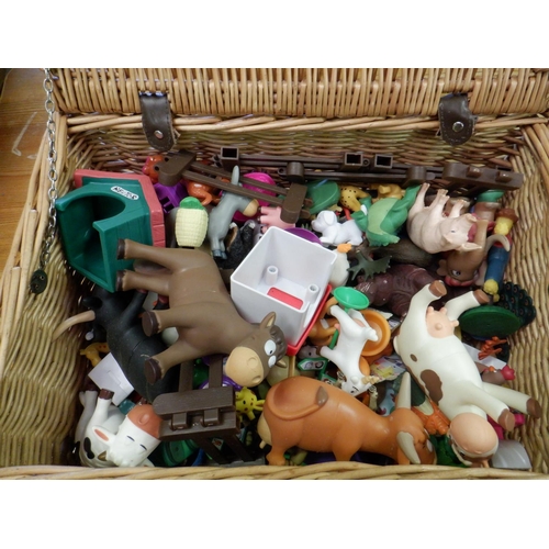 644 - A Wicker Basket of Play Animal Toys