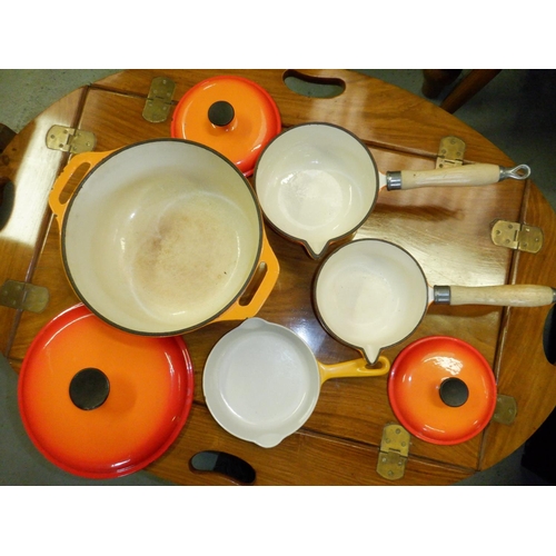 654 - An Orange Le Cruset Casserole Pot, 2 x Lidded Saucepans and Small Frying Pan