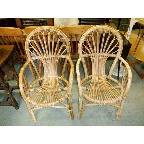 670 - 2 x Cane Armchairs ( Slight Damage to Trim as Pictured)