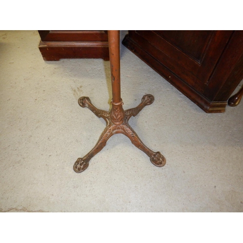 687 - An Antique Music Stand on an Iron Base