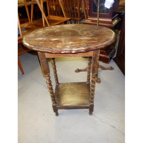 688 - An Oak Pie Crust Oval Table with Lower Shelf on Turned Legs 59 x 42 x 72cm