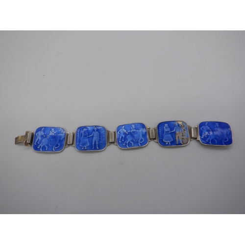 177c - A Hallmarked Silver and Blue Enamel Bracelet ( some losses to enamel and broken clasp)