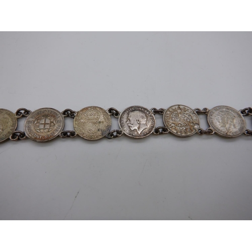 182b - A Silver Threepenny Bracelet