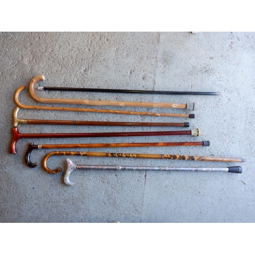 693 - 8 x Walking Sticks inc. Cane , Metal Adjustable and Others