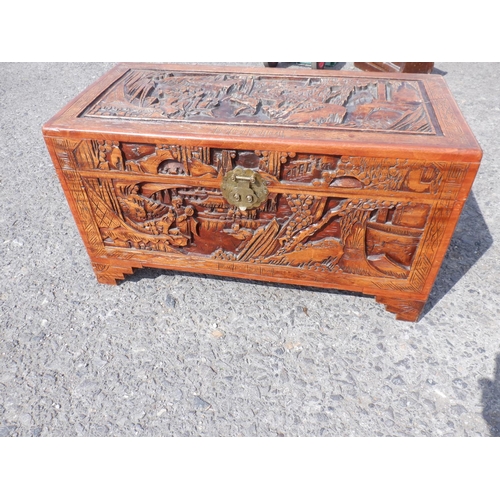 59 - A Heavily Carved Chinese Chest 88 x 43 x 50cm