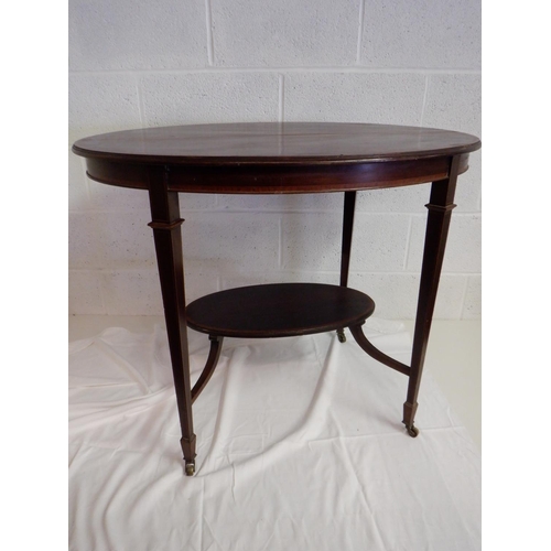 264 - Flame Mahogany Topped Oval Table with Ebony and Box Banding on Brass Castors ( split on top) 91 x 67... 