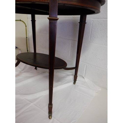 264 - Flame Mahogany Topped Oval Table with Ebony and Box Banding on Brass Castors ( split on top) 91 x 67... 