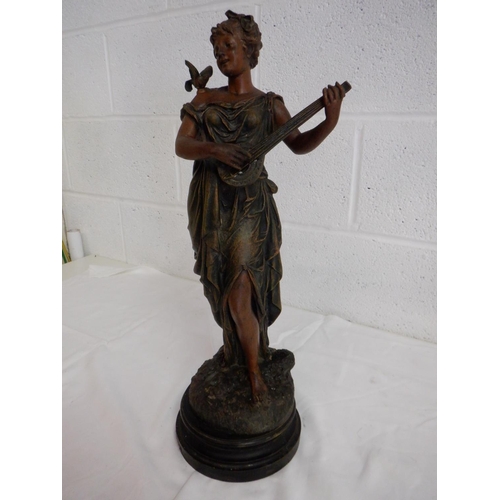 281 - Spelter Like Figurine Named 