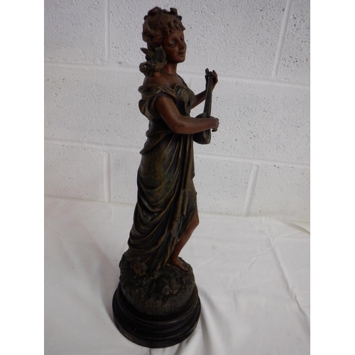 281 - Spelter Like Figurine Named 