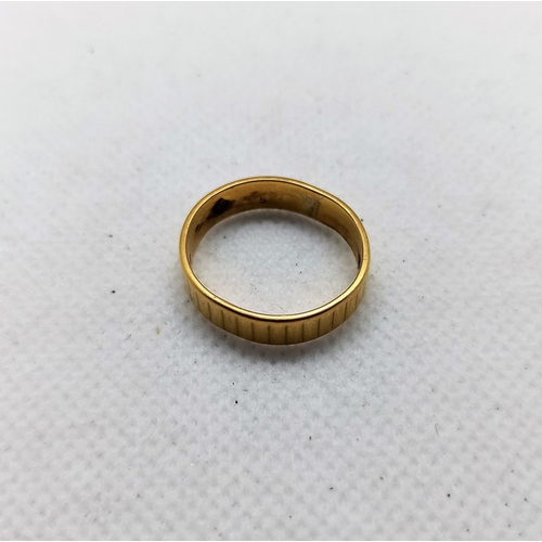 747 - A Hallmarked 22ct Gold Wedding Band ( Slight Misshapen) Size M 4.7 grms