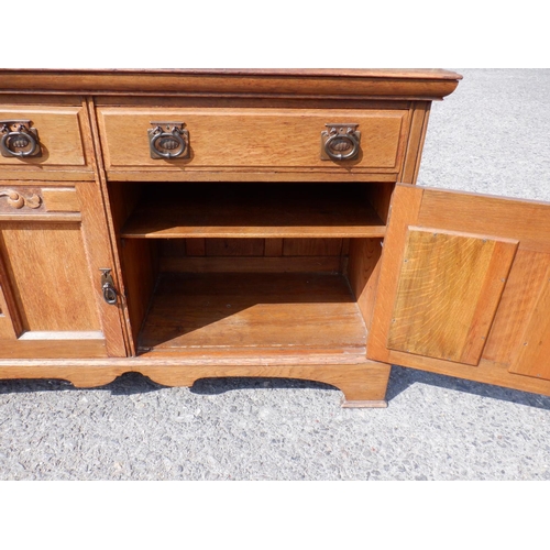 1479 - A 2 Drawer Oak Sideboard with Acanthus leaf carving on dovetailed bracket feet 152x54x93cm