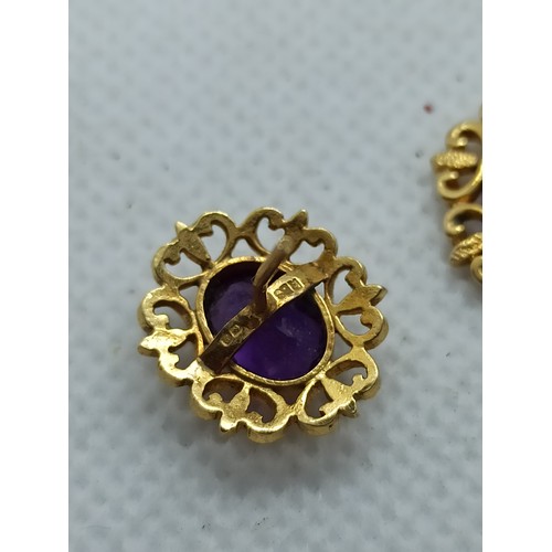 108 - A Pair of Ornate 9ct Yellow Gold and 0.75ct Amethyst Earrings - Total weight 2.8gms