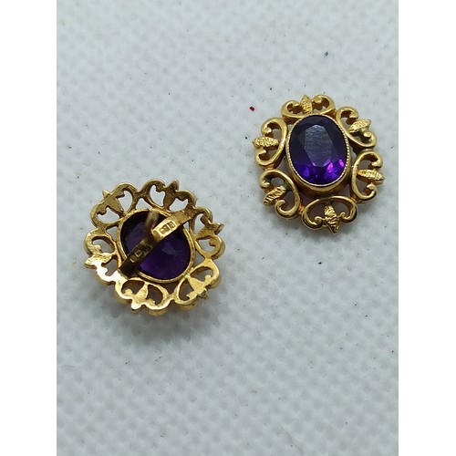 108 - A Pair of Ornate 9ct Yellow Gold and 0.75ct Amethyst Earrings - Total weight 2.8gms