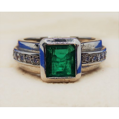 103 - A 2ct (Estimated Natural Columbian Emerald Set in an 18ct White Gold Ring with 12 Diamonds (6 to eac... 