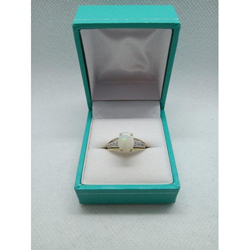 140 - 9 Carat Hallmarked Gold and Opal Ring with Diamonds to Shoulders 2.6 Grams, Size L/M