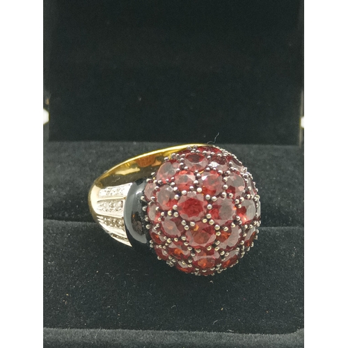 213 - A Substantial 18ct Gold, Ruby and Diamond Ring, Size N/O , 9.11 Grams