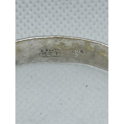 234 - An Aztec Zodiac Silver Bangle 16 Grams