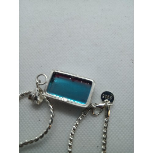 236 - A Silver Necklace with Large Blue Pendant