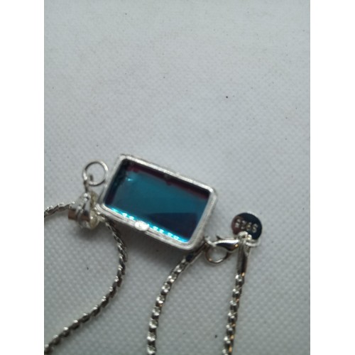 236 - A Silver Necklace with Large Blue Pendant