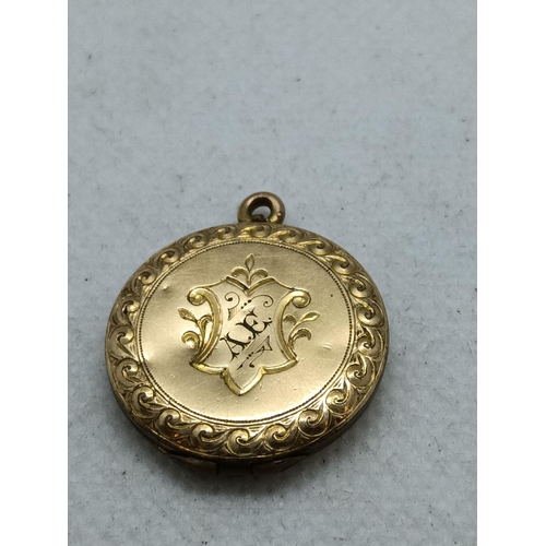 132 - 9ct Gold (Tested) Mongrammed AE Locket, 3.27 grams