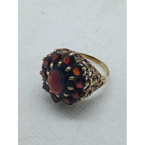 102 - A Substantial 9ct Yellow Gold and Garnet Cluster Ring , Size O,  Weight 7.08 Grams