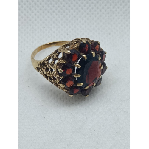 102 - A Substantial 9ct Yellow Gold and Garnet Cluster Ring , Size O,  Weight 7.08 Grams