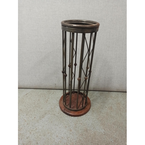 82 - A Wrought Iron Umbrella Stand on Wooden Base