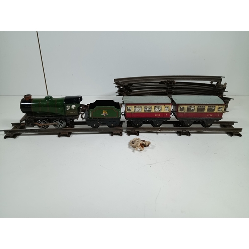 582 - A 1930's Hornby Meccano Mechanical Clockwork Tin Plate Railway Engine, Tender  1995 Carriage and TRa... 