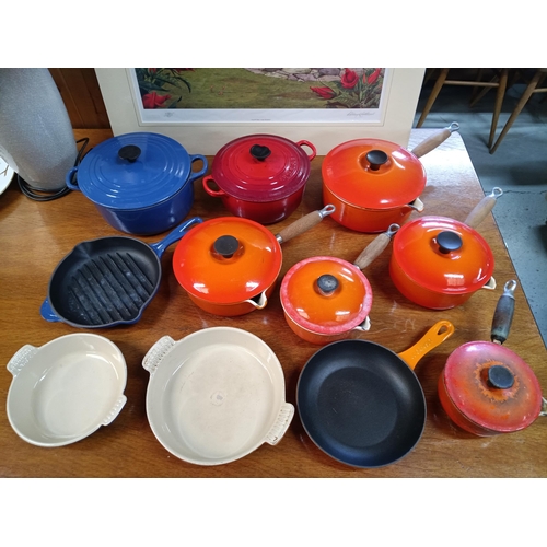 460 - A Quantity of Red and Blue Le Cruset Cookware