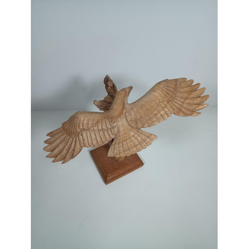 419 - A Hand Carved Wooden Eagle Ornament 25cm High, 25cm Across