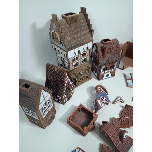 425 - A Collection of Eastern European Pottery Nightlight Houses - Some Damaged ( for repair)