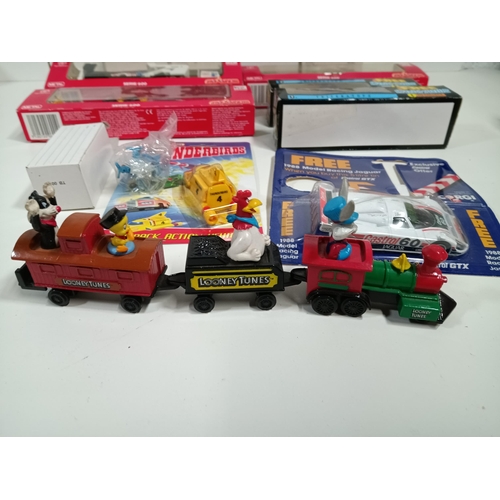 559 - A Collection of Model Cars Including Looney Tunes Train Thunderbirds 1 and 4 etc.