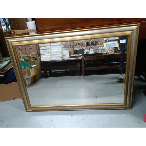 53 - A Large Framed Mirror 105 x 76cm