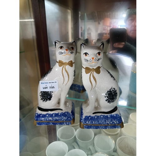 731 - A Pair of Staffordshire Pottery Cats 18cm Tall